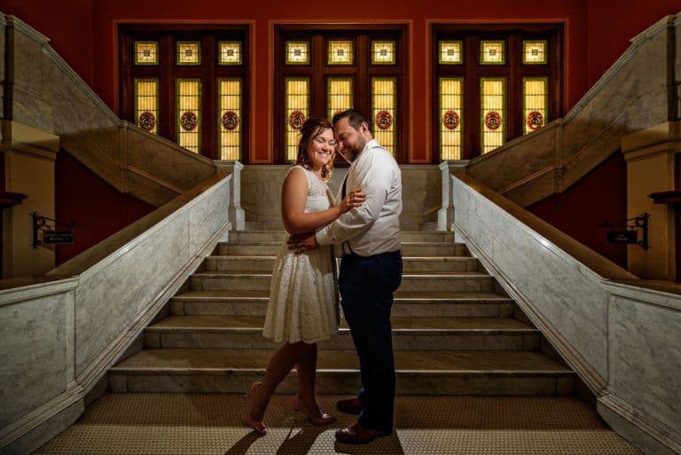 Dramatic Wedding Portrait on Steps at Marquette County Courthouse
