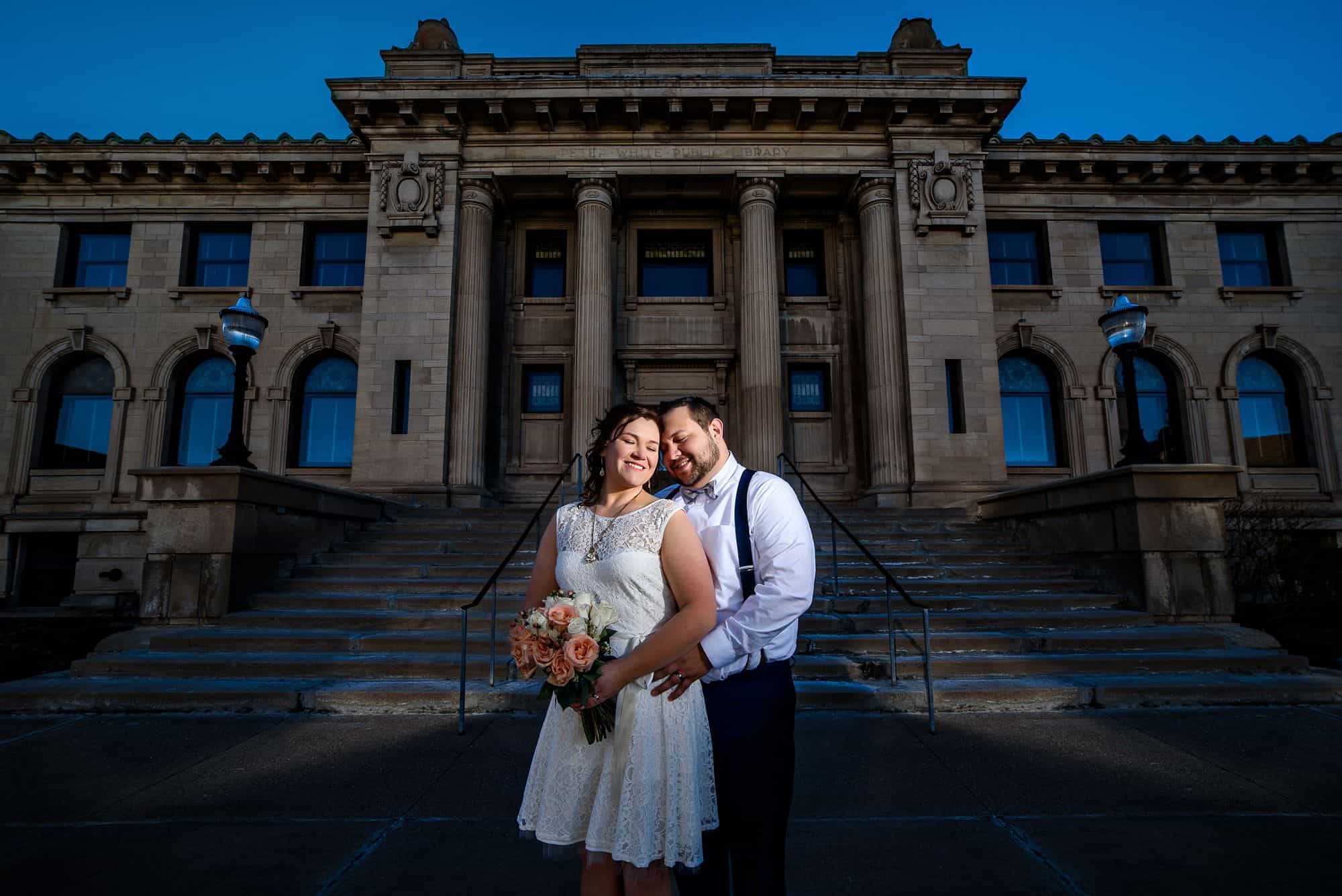 Dramatic portrait of bride and groom at Peter White library in Marquette, Michigan